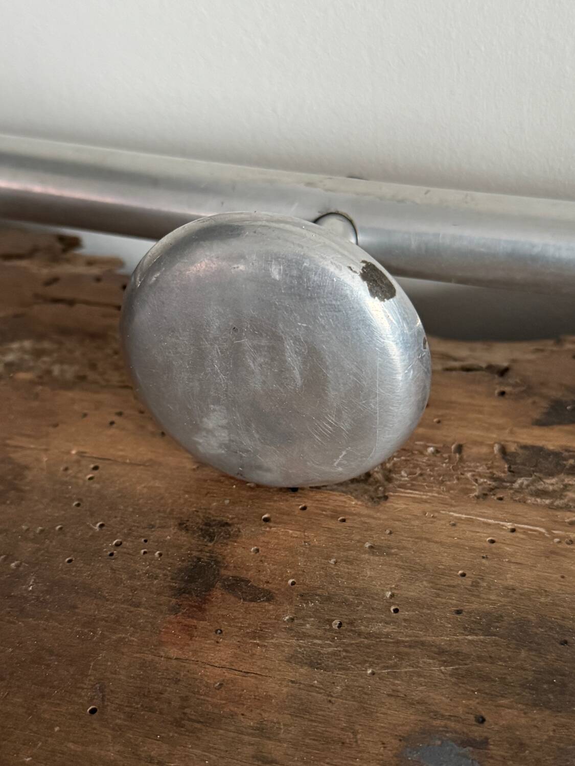 Vintage wall-mounted aluminum coat rack