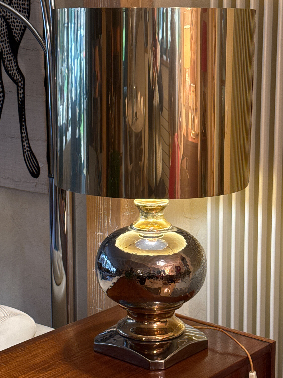 Beautiful ceramic base lamp with a golden metal shade.