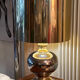 Beautiful ceramic base lamp with a golden metal shade.