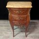 Pair of curved Louis XV style bedside tables