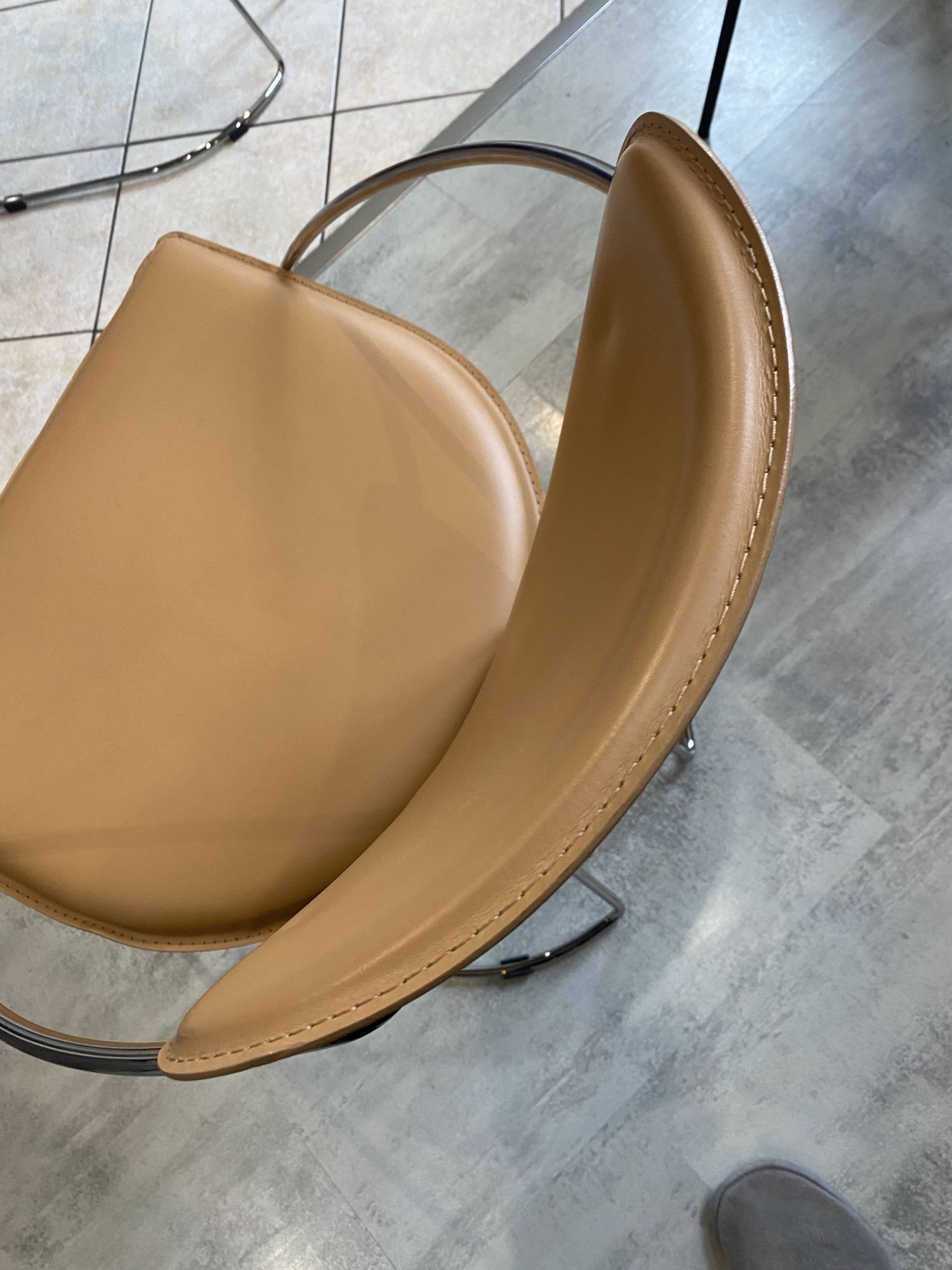 1 Linda armchair chair by Arrben in camel brown leather with a chrome steel frame.