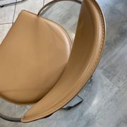 1 Linda armchair chair by Arrben in camel brown leather with a chrome steel frame.