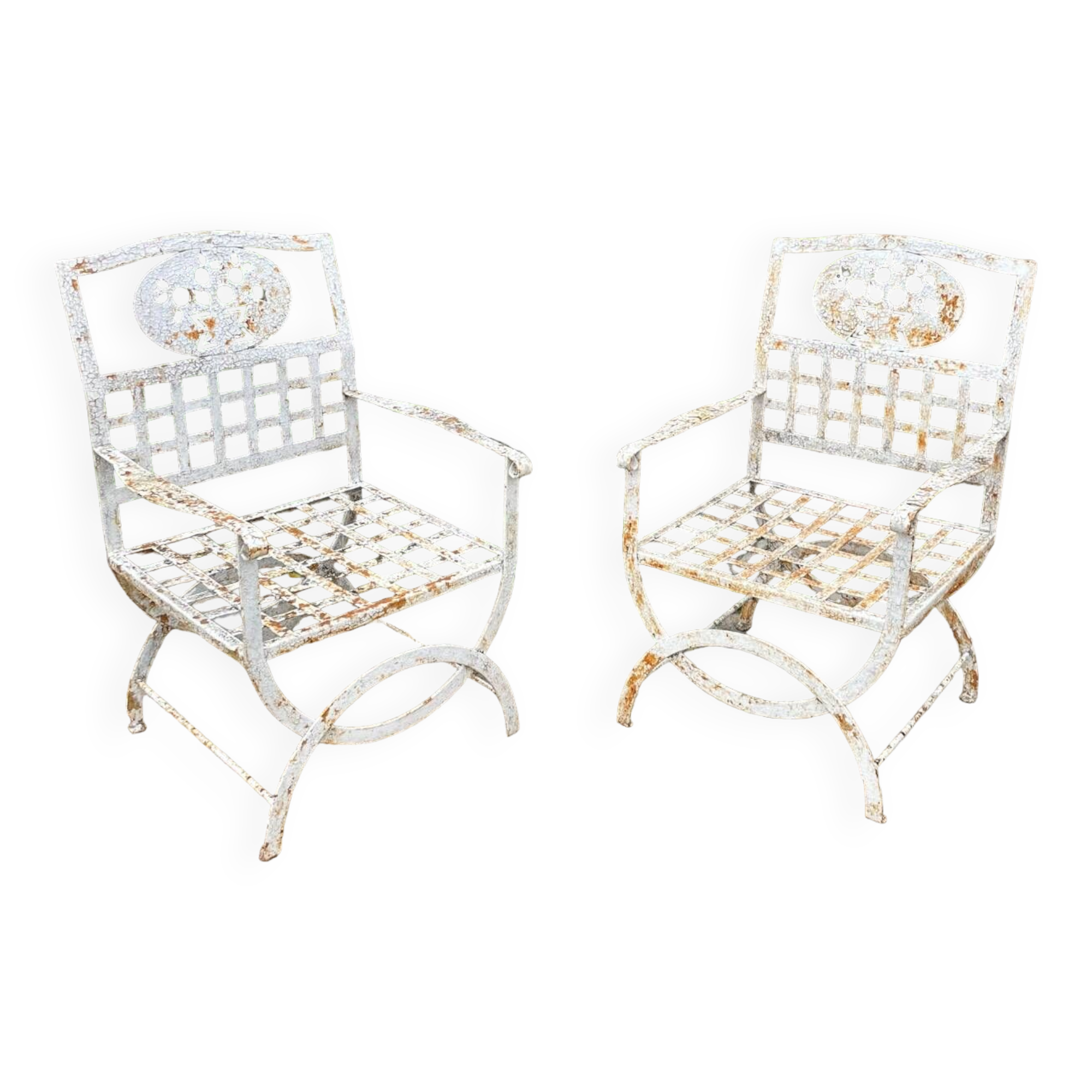 Pair of wrought iron armchairs