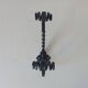 Brutalist wall coat rack in wrought iron.