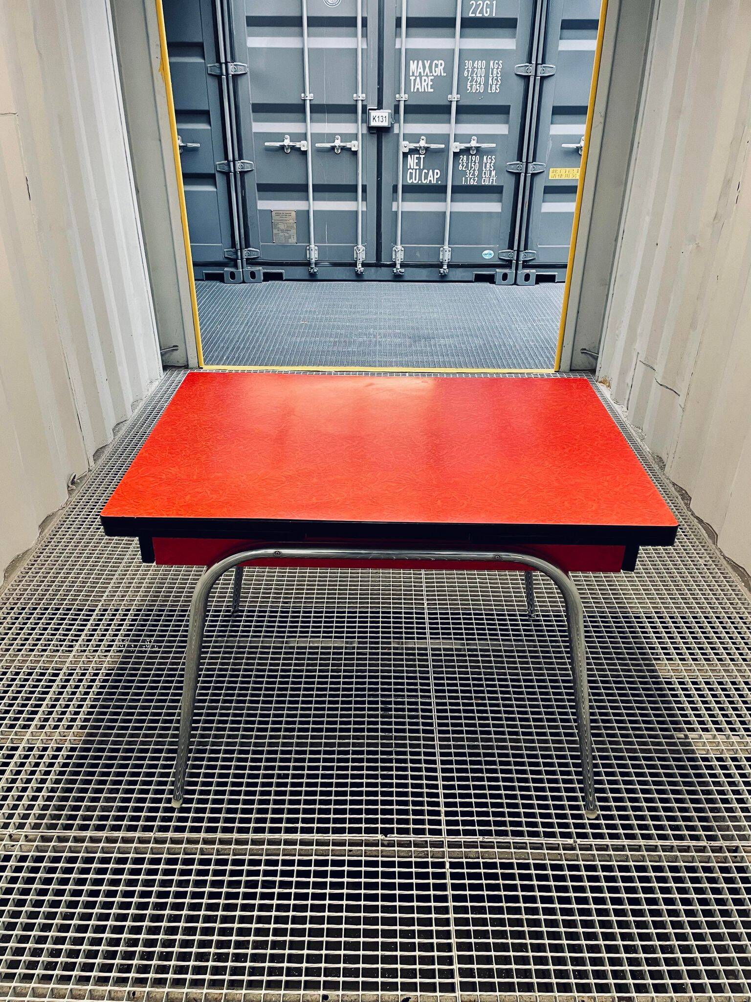 Vintage red formica table from the 60s with extensions