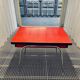 Vintage red formica table from the 60s with extensions