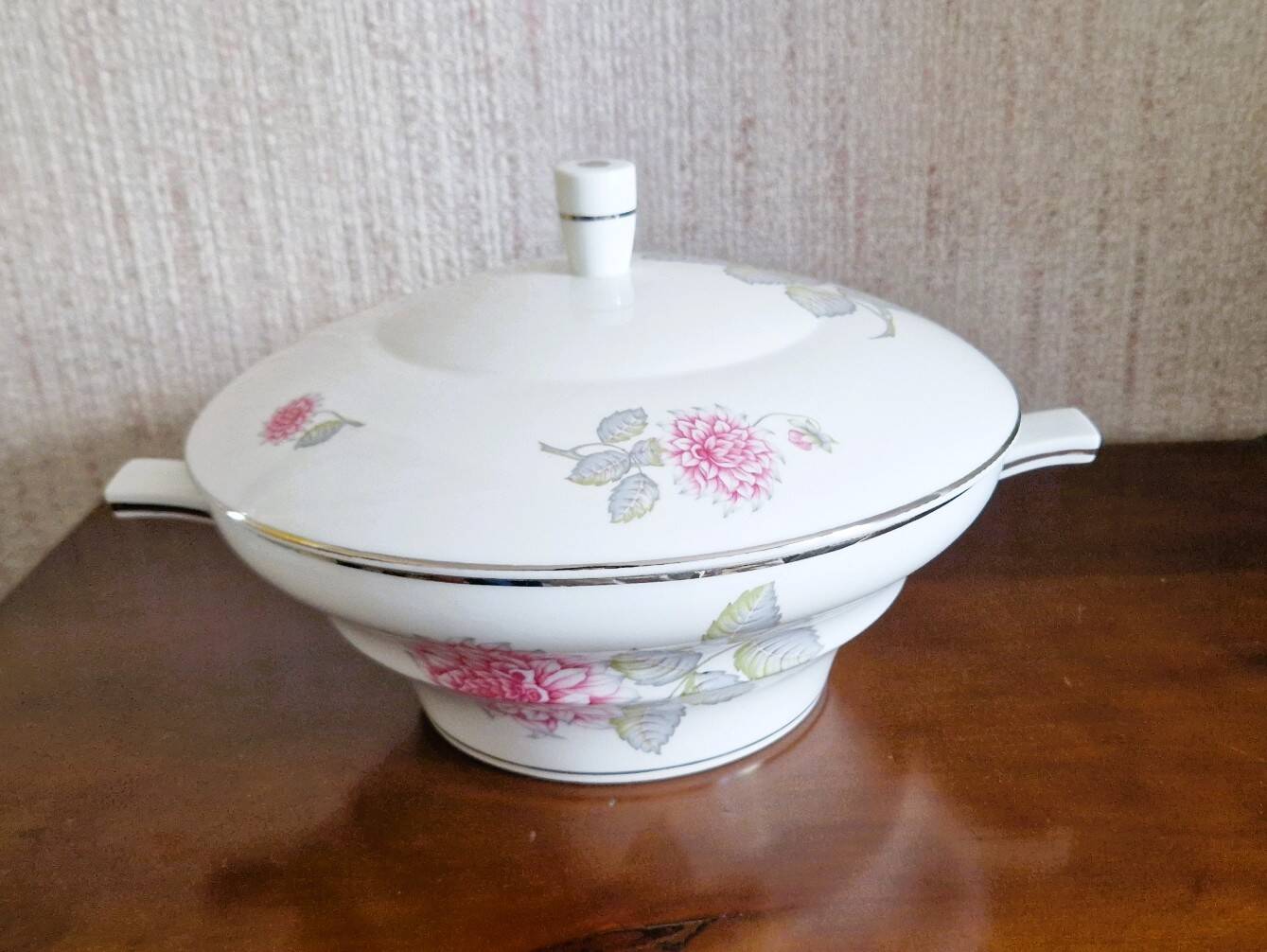 White porcelain soup tureen by Haviland with Dahlia patterns.