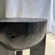 Black mango wood tripod side table with a semi-spherical top, height: 45 cm, diameter: 44 cm.