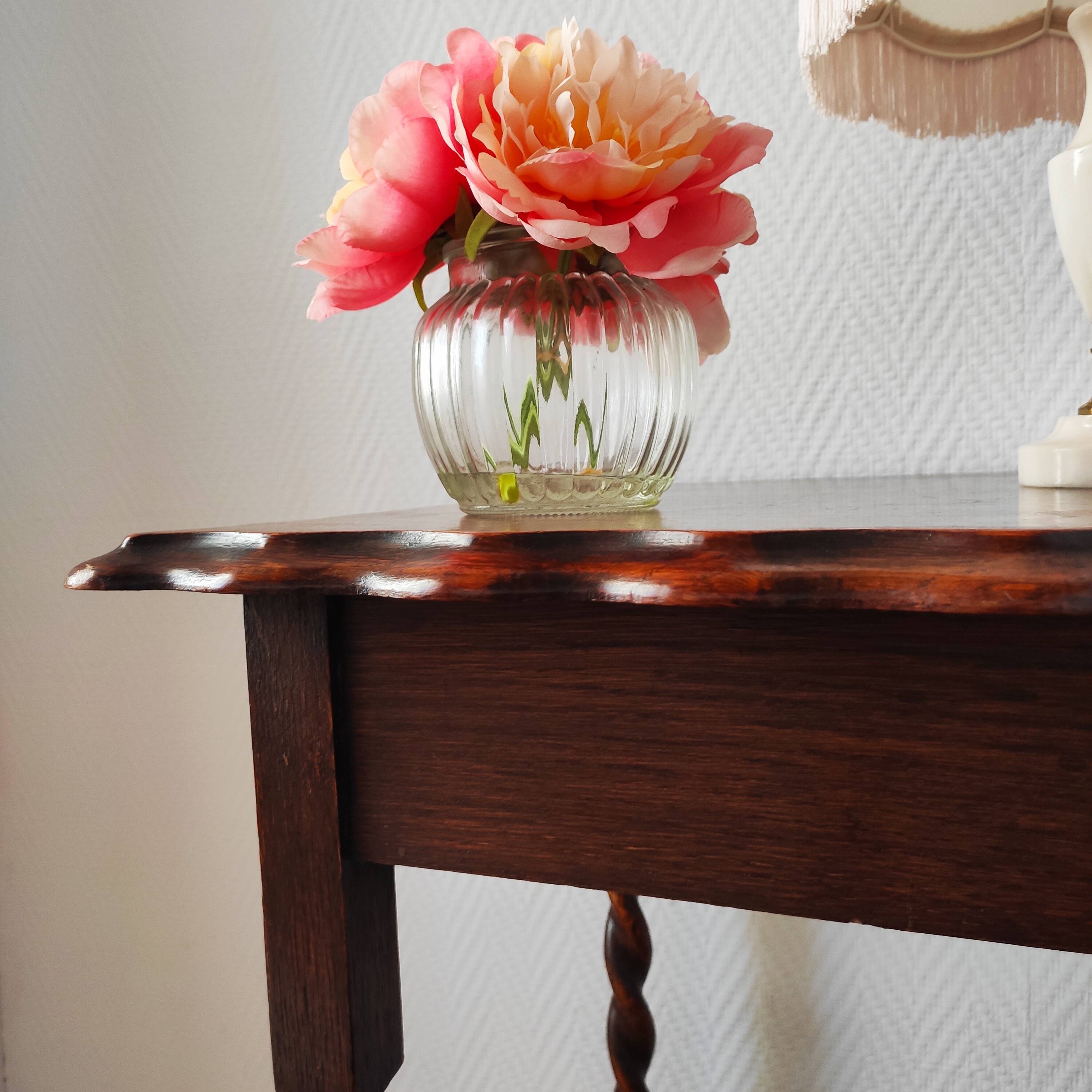 Antique solid oak side table with turned wooden legs.