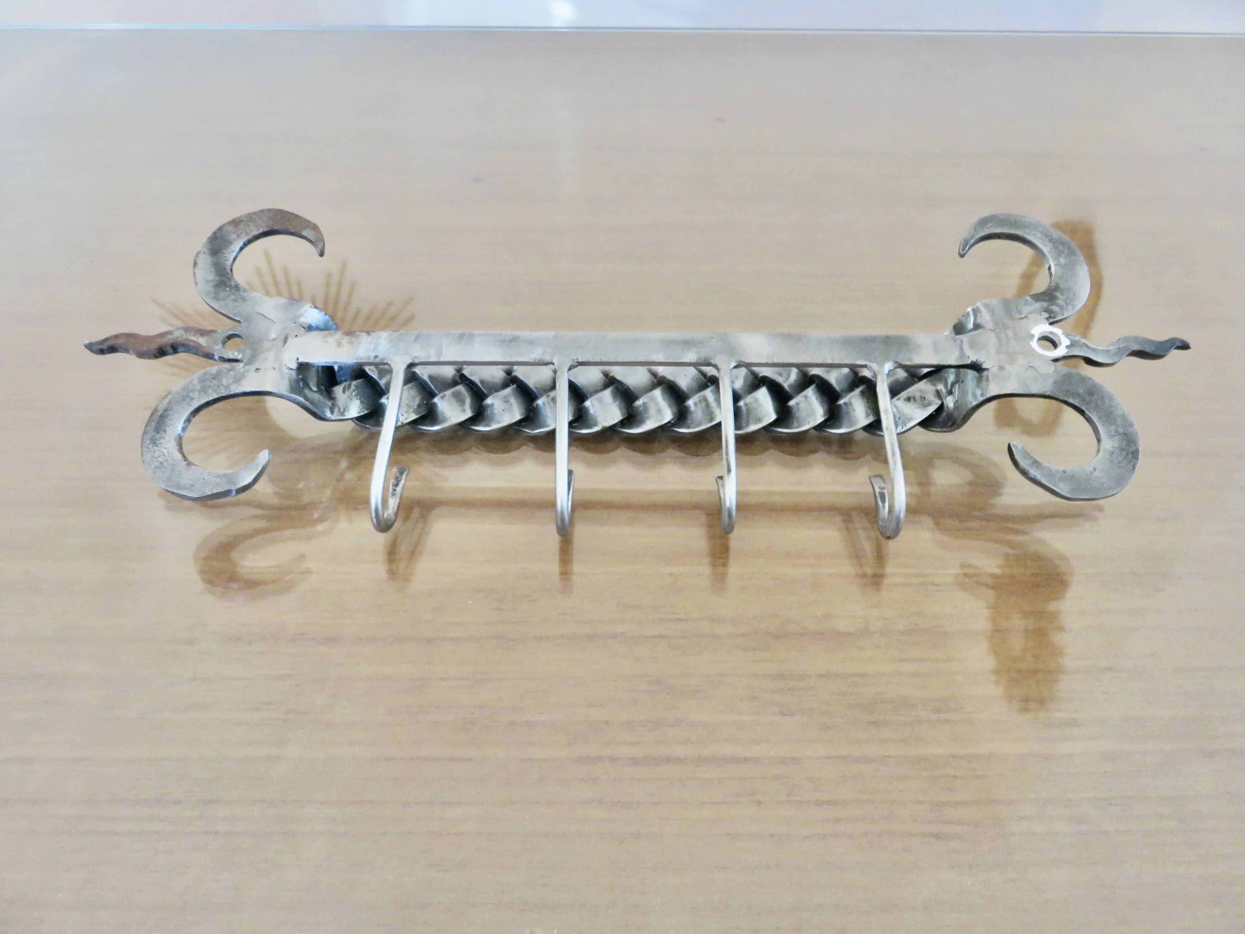 2 Tea towel holders, ironwork in braided raw steel, 1970