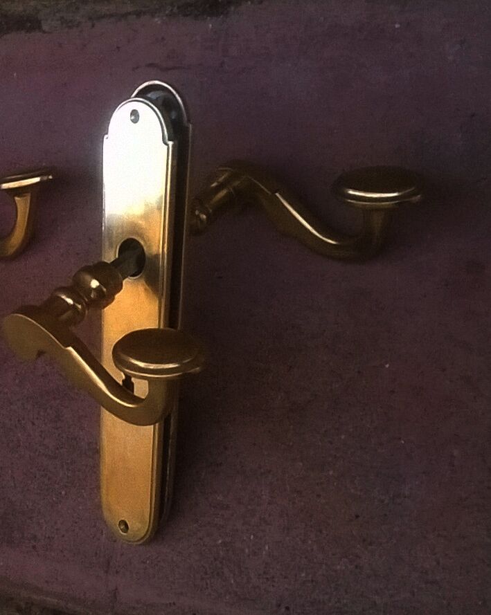 Series of ten sets of vintage door handles