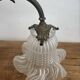 Antique bronze wall light in Louis XVI style - tulip-shaped glass paste flower.