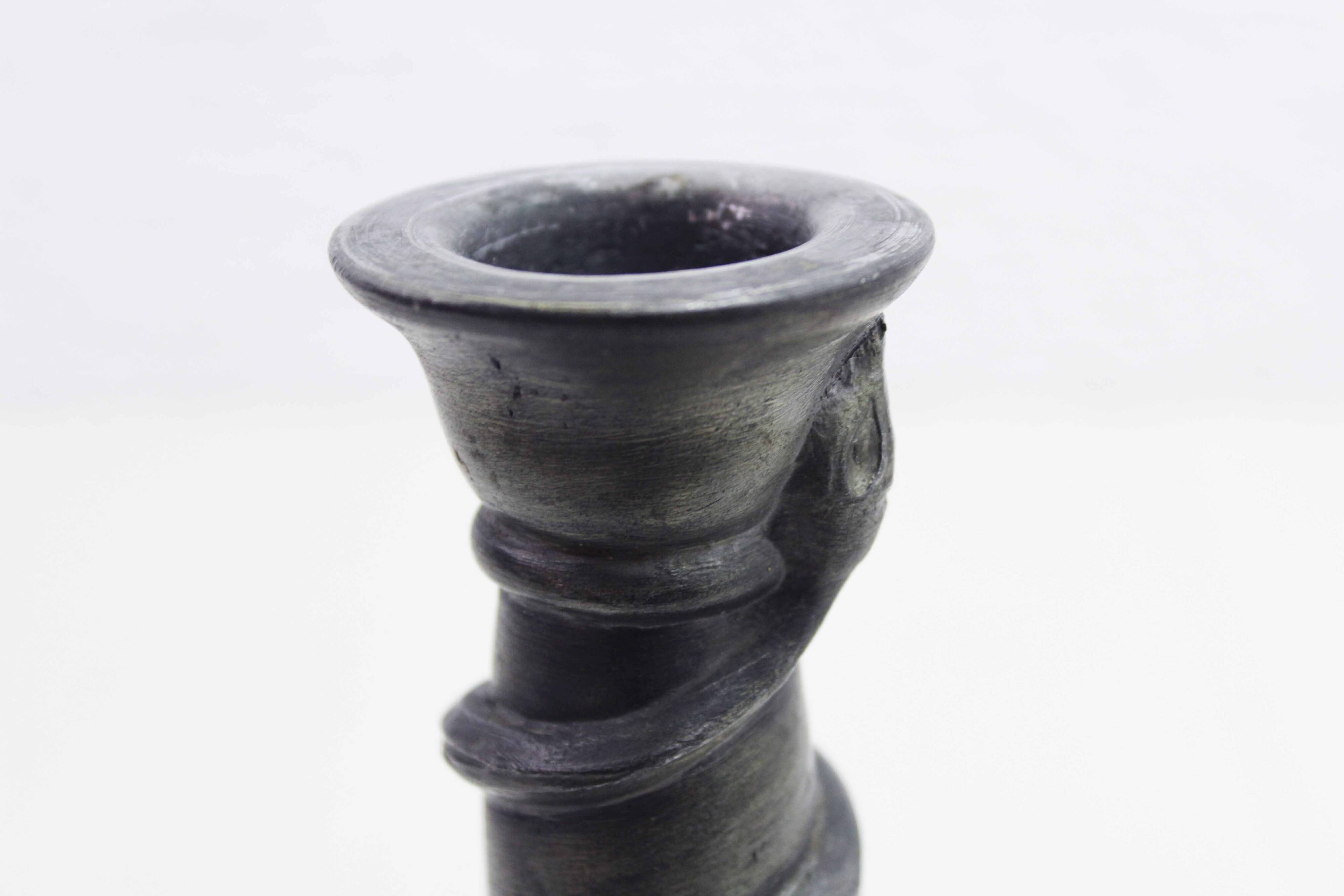 Serpent candlestick in pewter, early 20th century.