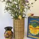 Tall box with woven straws