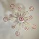 Venetian Rezzonico chandelier in colourless and red Murano glass, circa 1900.