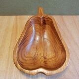 Empty wooden pocket in the shape of a vintage pear