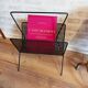 Metal magazine holder