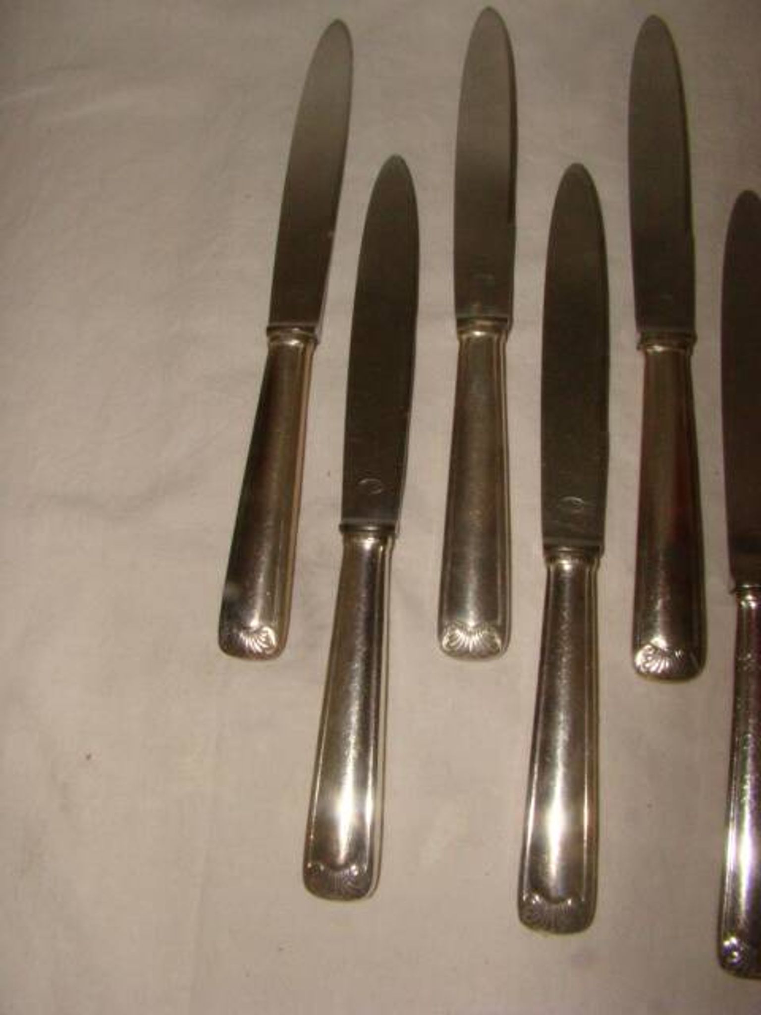 12 stainless steel table knives M.A. from the early 20th century.