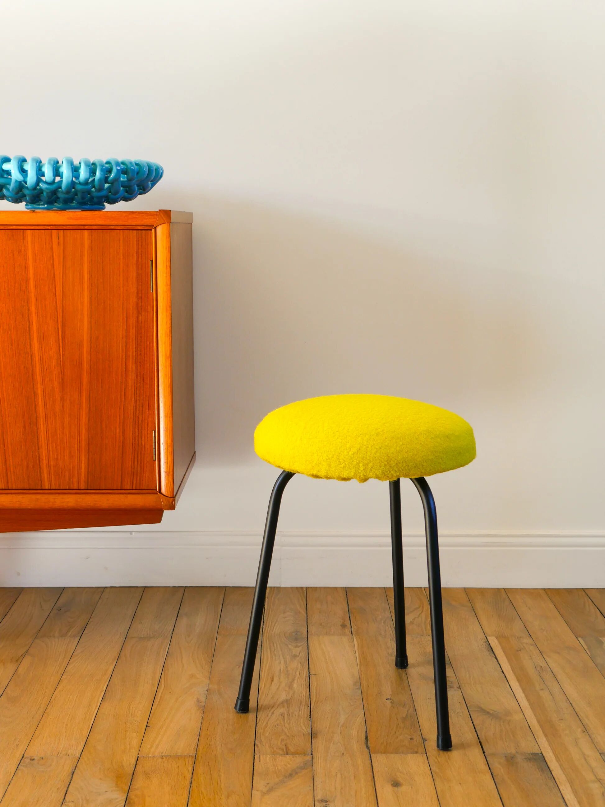 Black iron tripod stool with boiled wool, yellow, 1960.