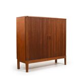 Armoire danoise à porte tambour en teck des années 1950