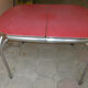 Vintage table of the 60s in red formica and chrome legs