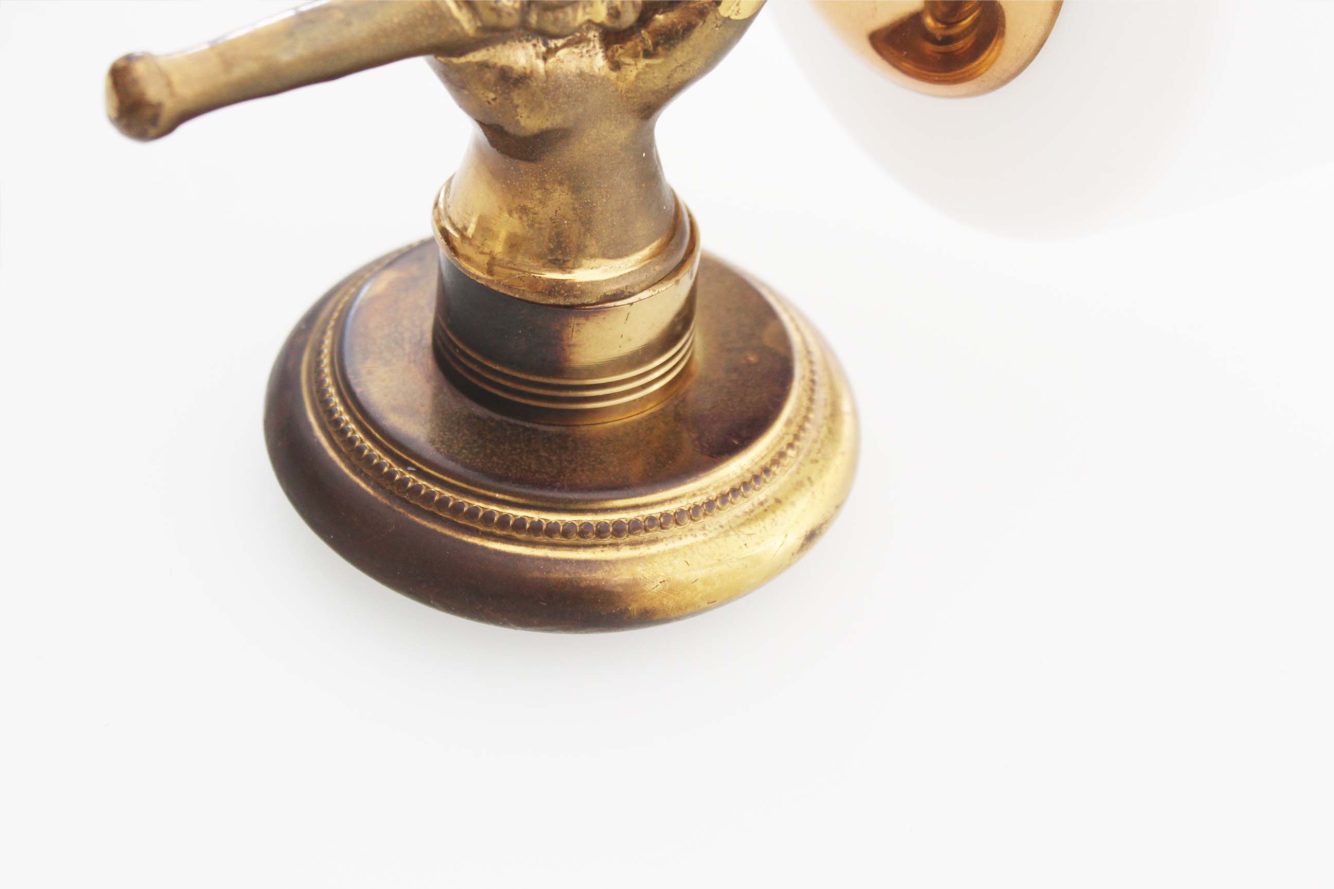 Pair of 1950’s solid brass ‘torch holding hand’ wall sconces by maison arlus