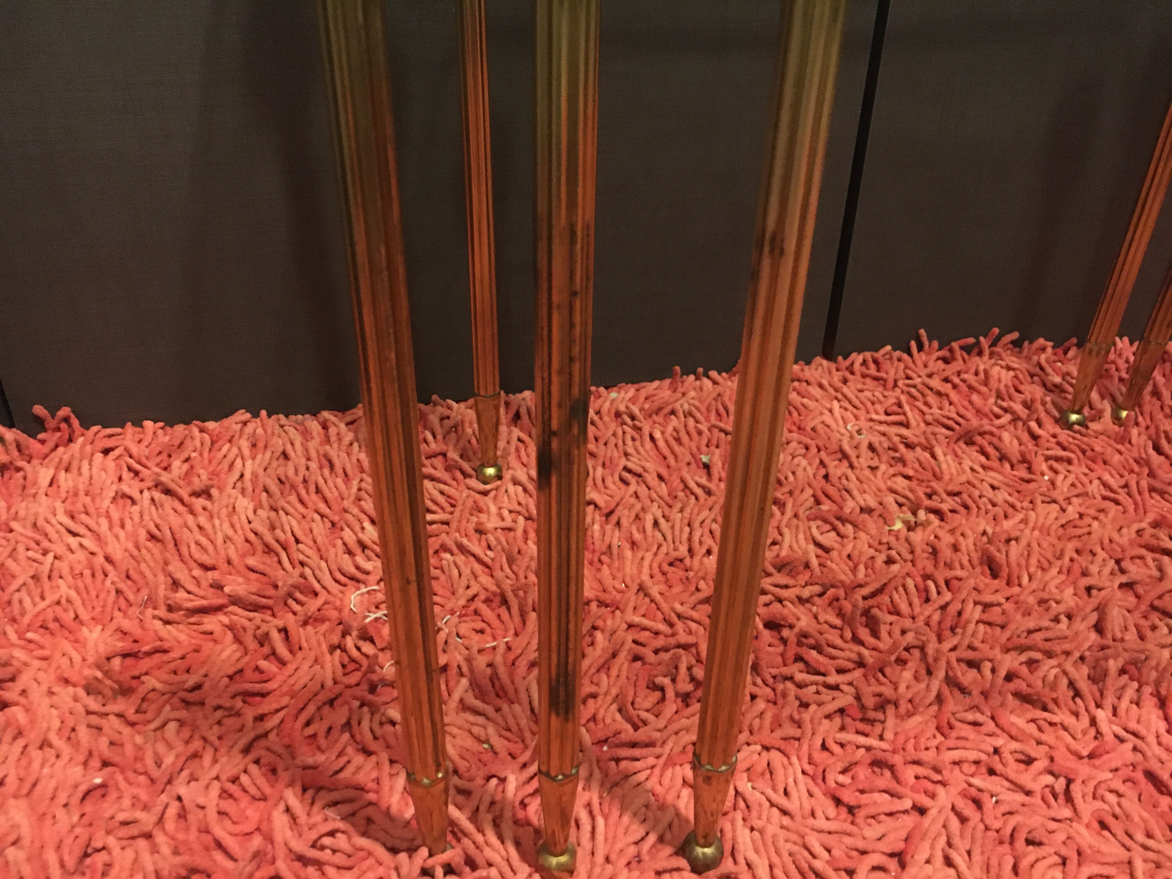 Brass and glass trundle tables