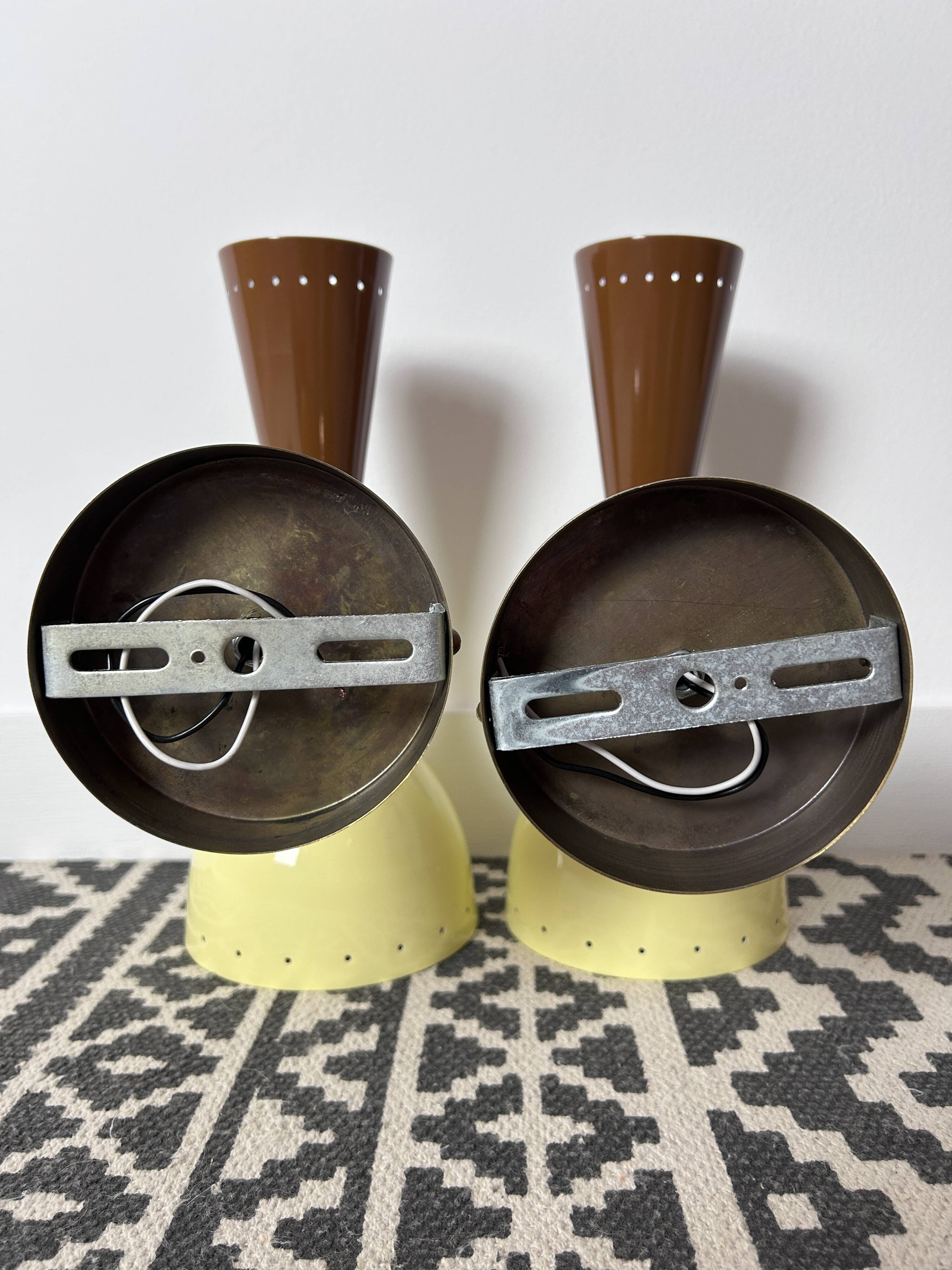 Pair of metal diabolo wall lights