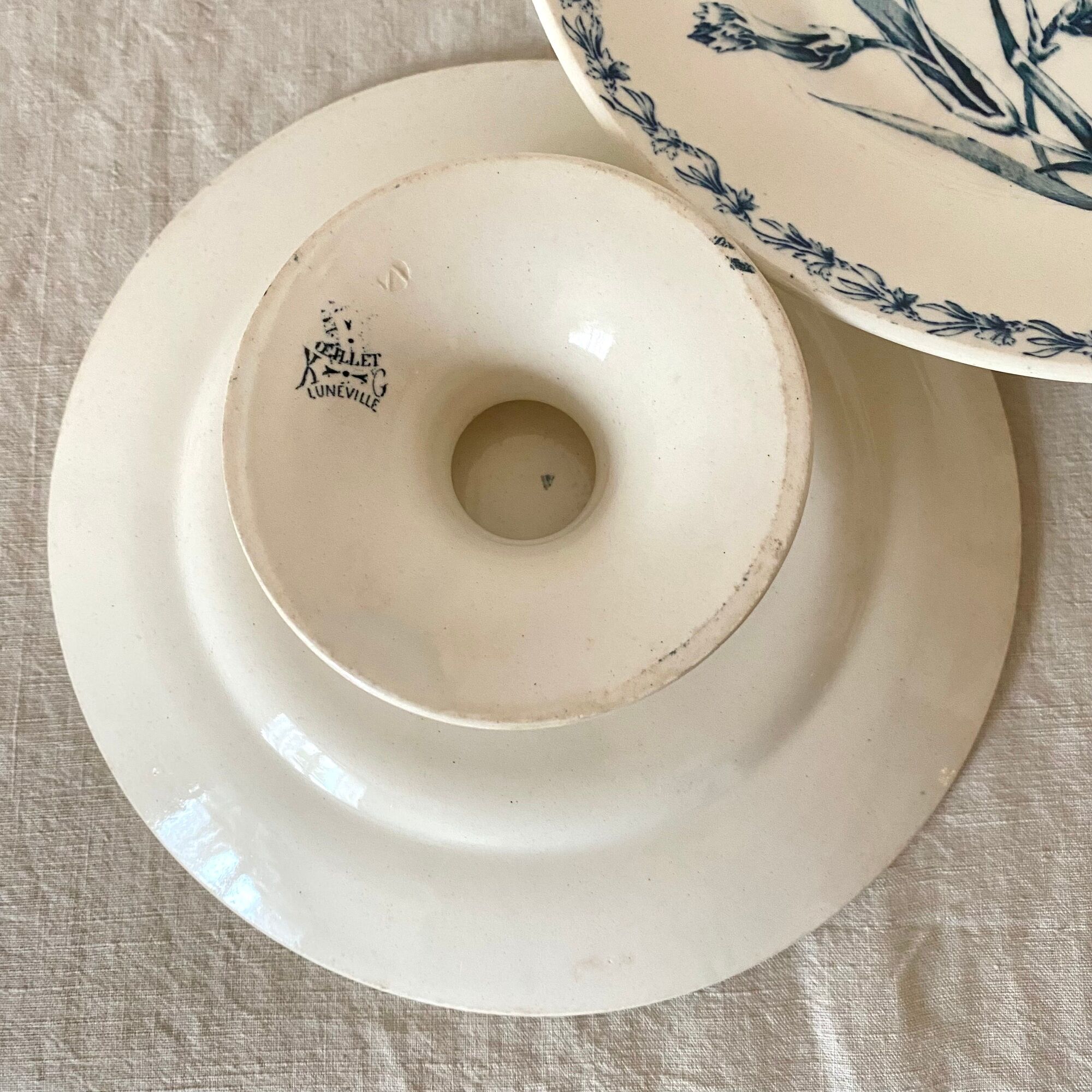 Antique dishes on foot in Luneville carnation porcelain
