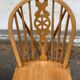 4 Windsor Wheelback English chairs in solid curved wood interior's