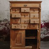 Solid oak dressmaker's cabinet with 13 drawers and 1 door