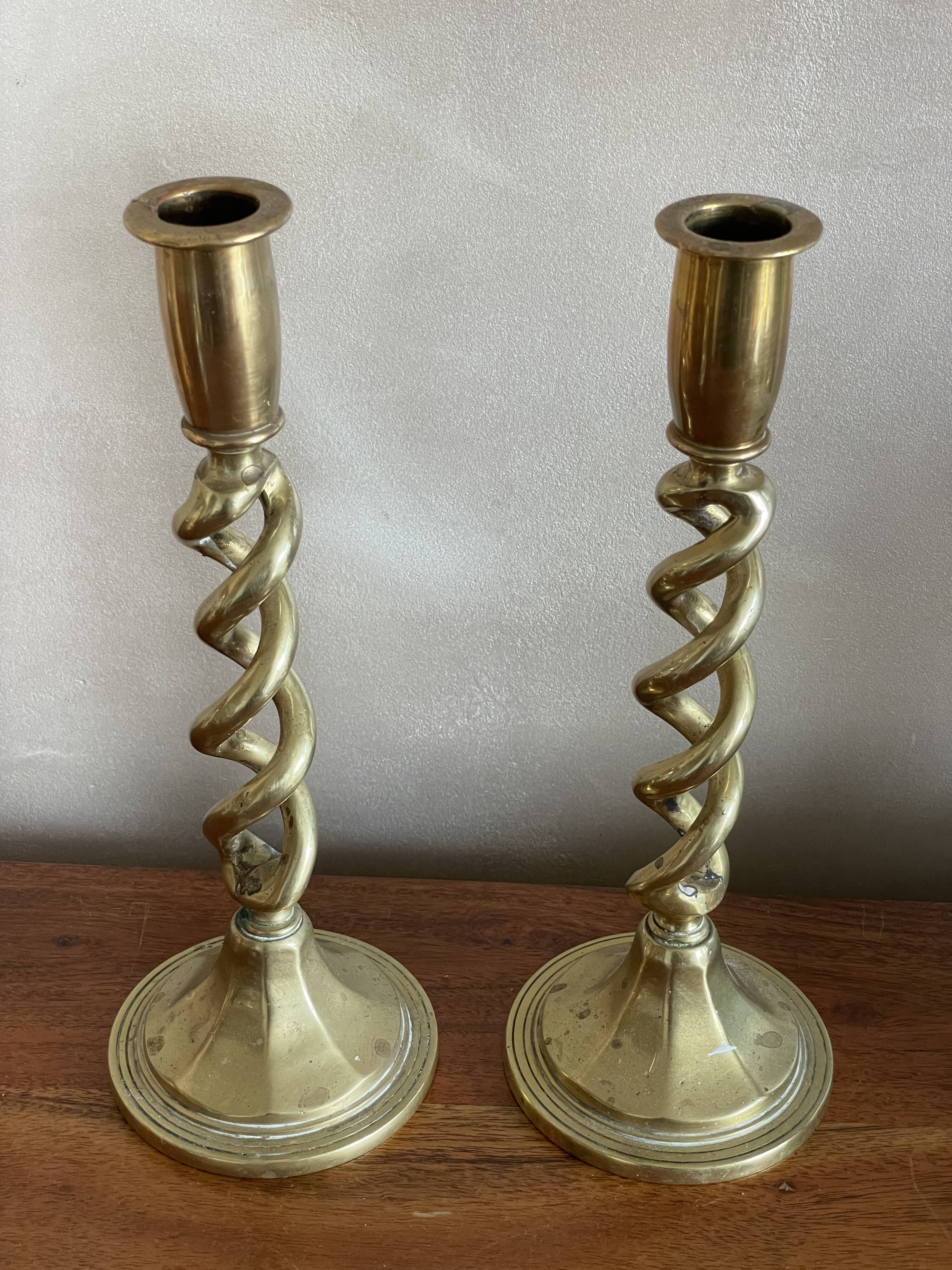 Duo of twisted brass candle holders