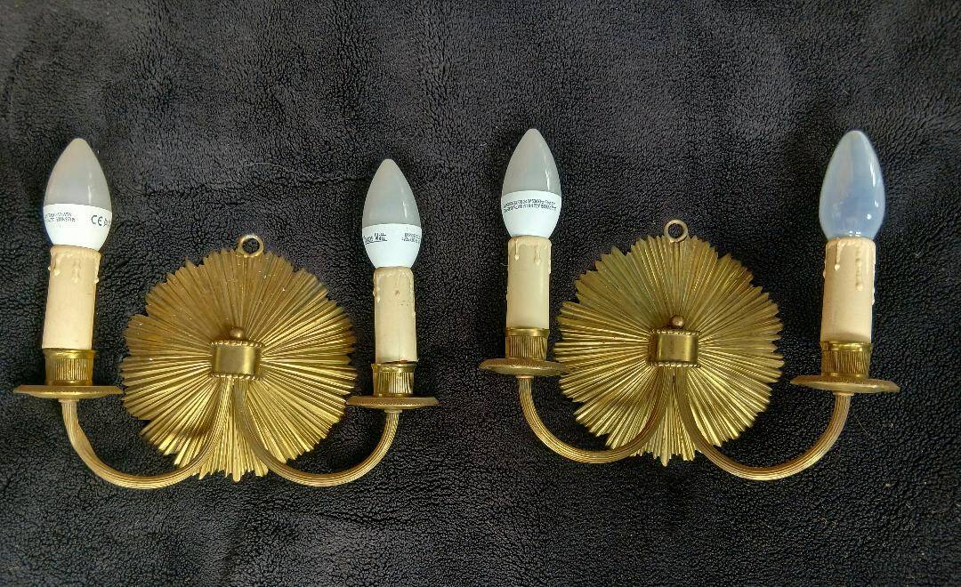 Paire d'appliques soleil en bronze Maison Charles