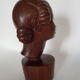 Wooden sculpture, "Young girl with macaroons" 30'