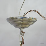 Antique Art Deco chandelier with three glass lampshades.