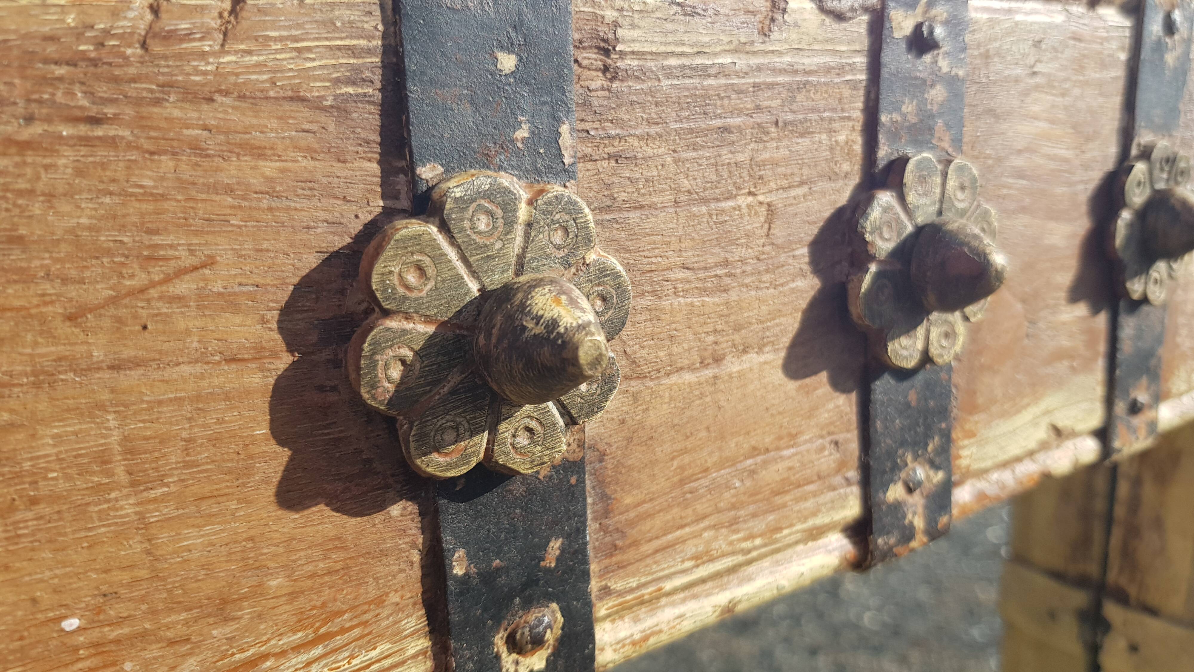 Old Burmese teak mirror with copper fittings