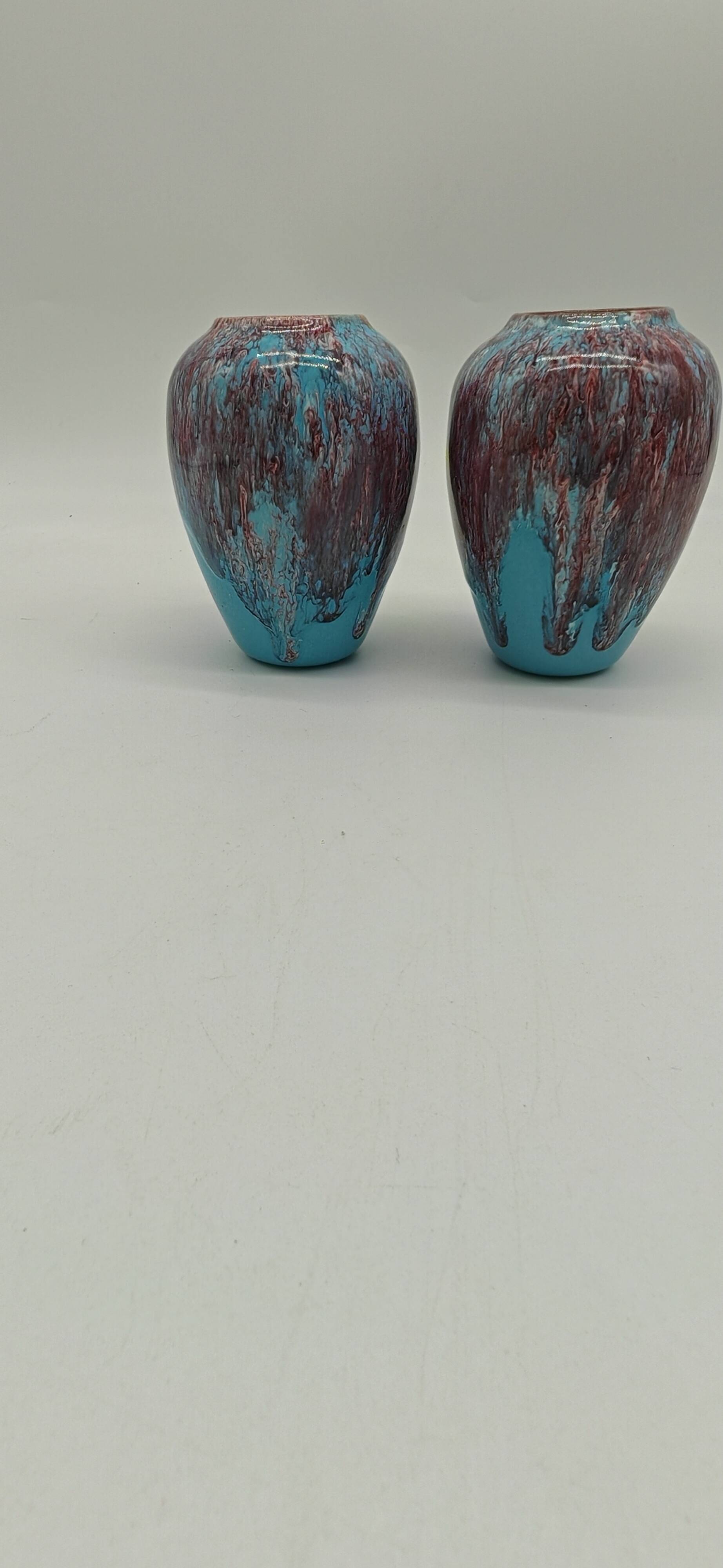 Pair of small turquoise blue vases in flamed stoneware with wine