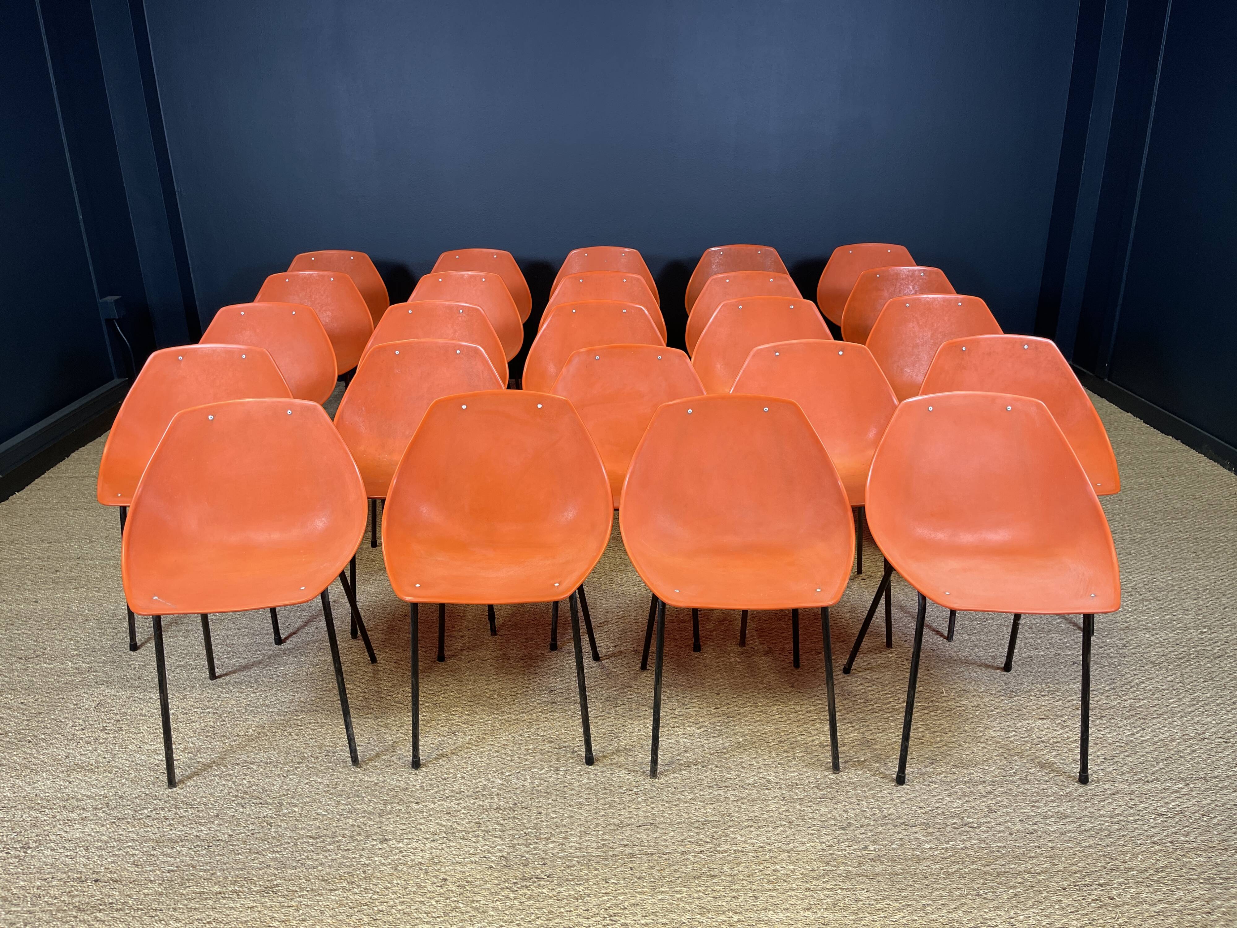 Set of 24 orange Guariche chairs