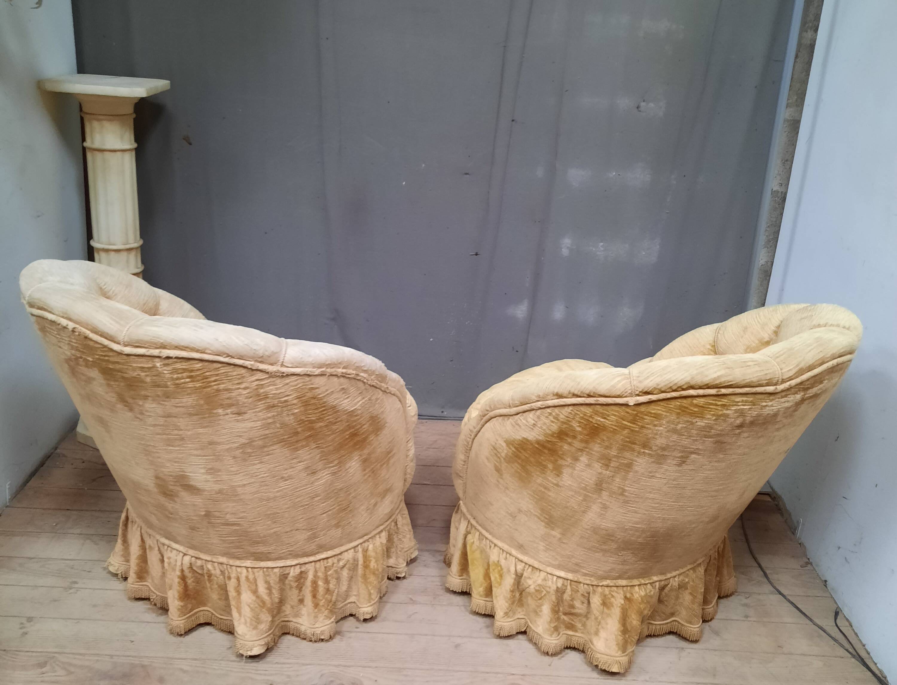 Pair of flared back toad armchairs