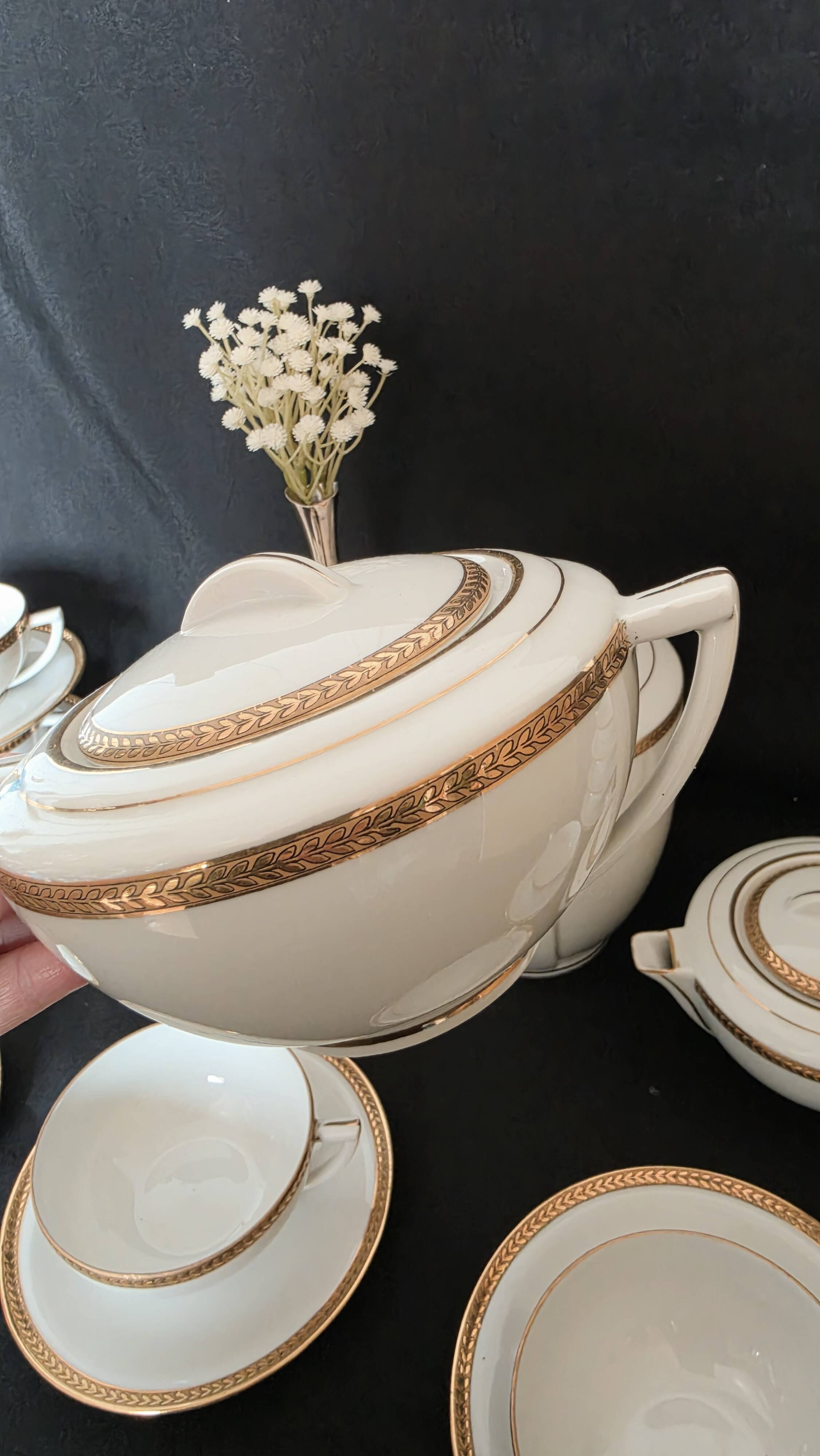 Coffee or tea service in Limoges porcelain and gold, France, Art style.