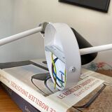 Pair of adjustable industrial metal wall sconces.