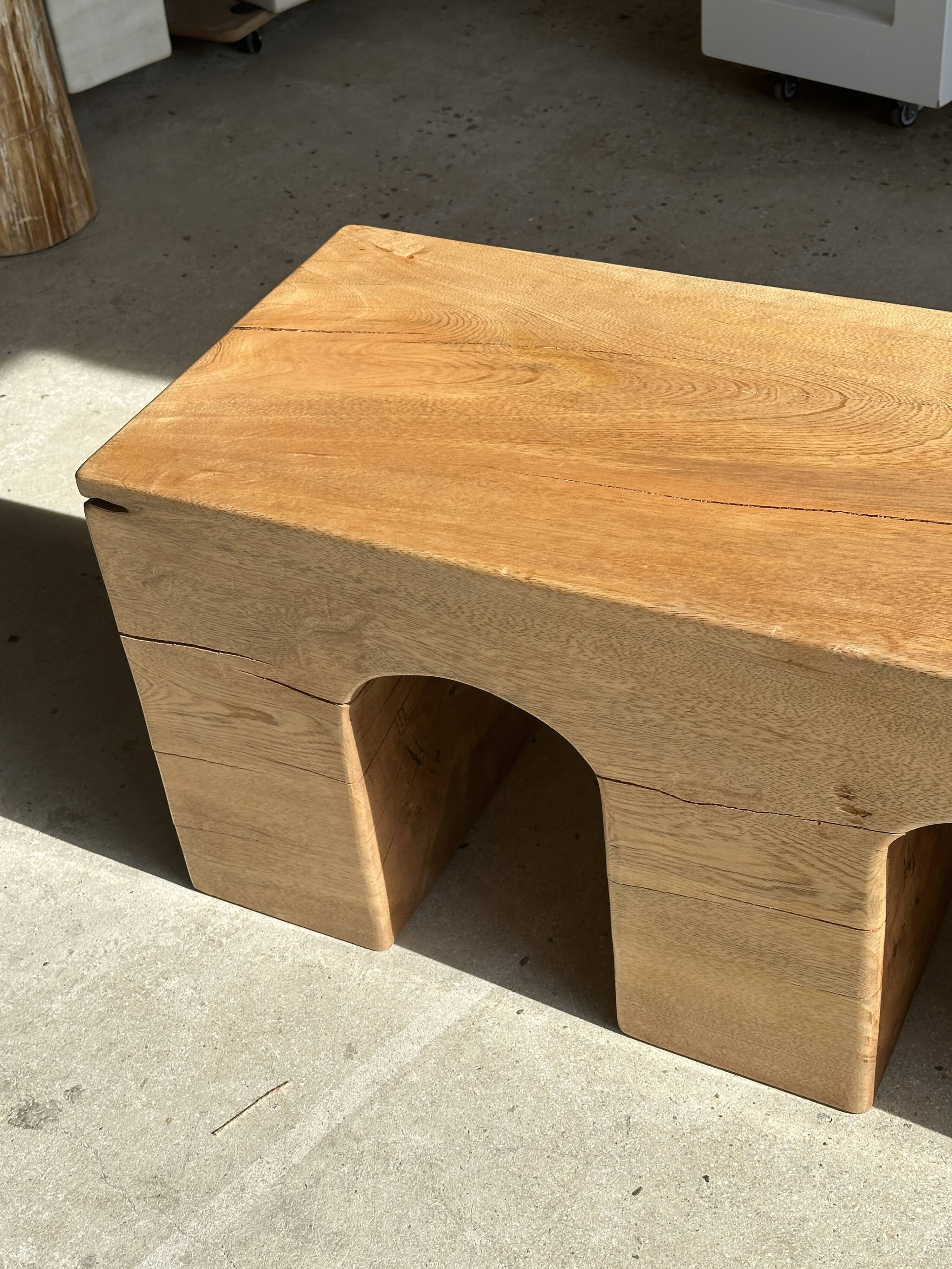 Solid monoxyl wood bench with carved 3-arch base - Natural wood color