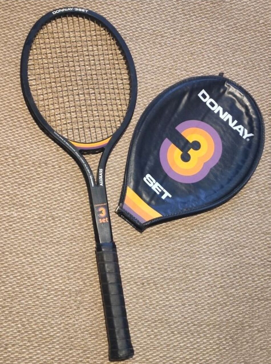 Tennis racket and its vintage cover