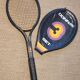 Tennis racket and its vintage cover