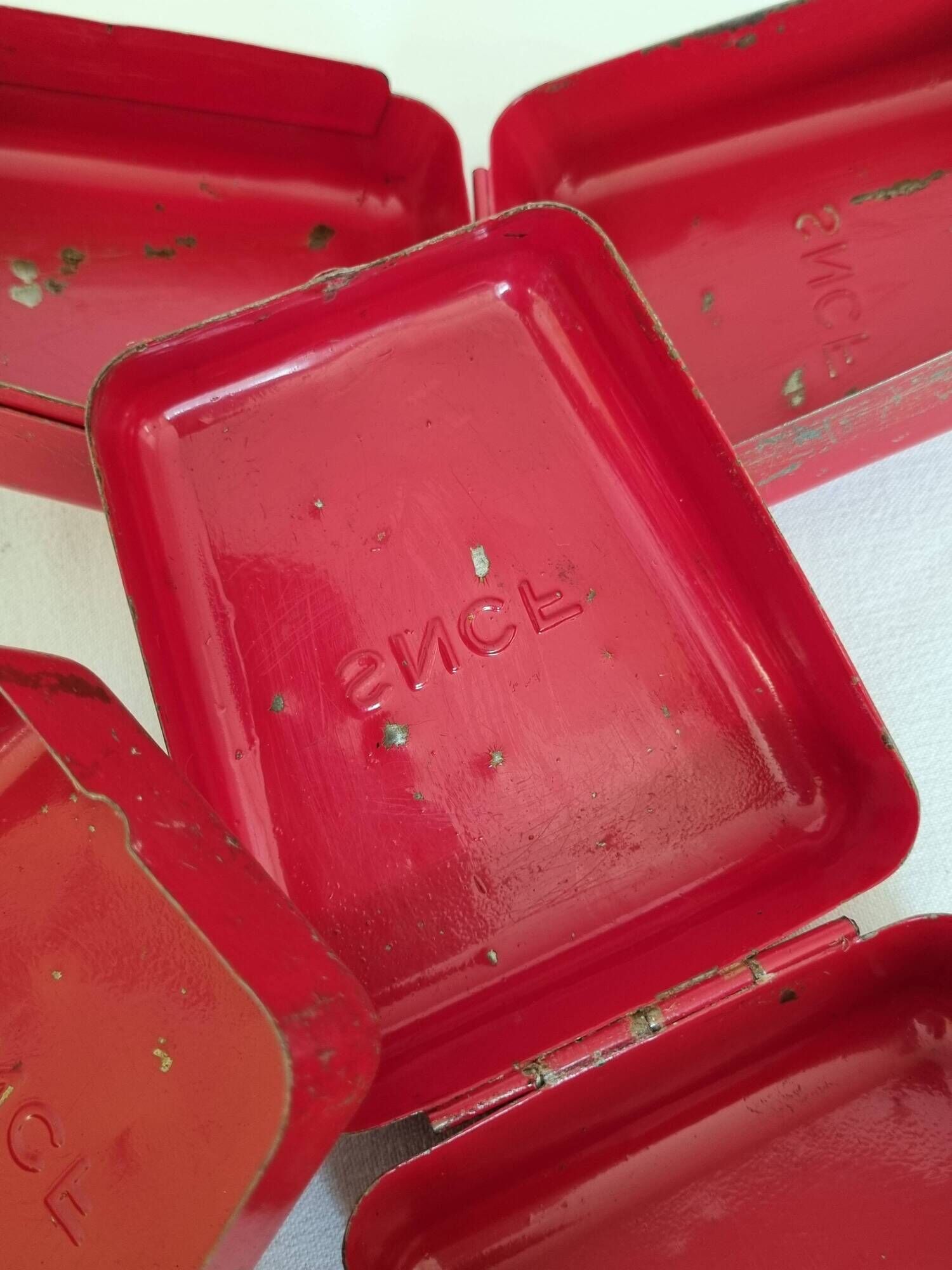 Set of three red painted metal railway boxes with SNCF logo