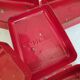Set of three red painted metal railway boxes with SNCF logo