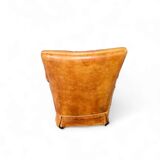 Sheep leather club chair 1970s with magazine holder