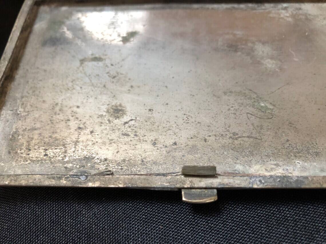 Chiseled bronze cigarette case from the late 19th century