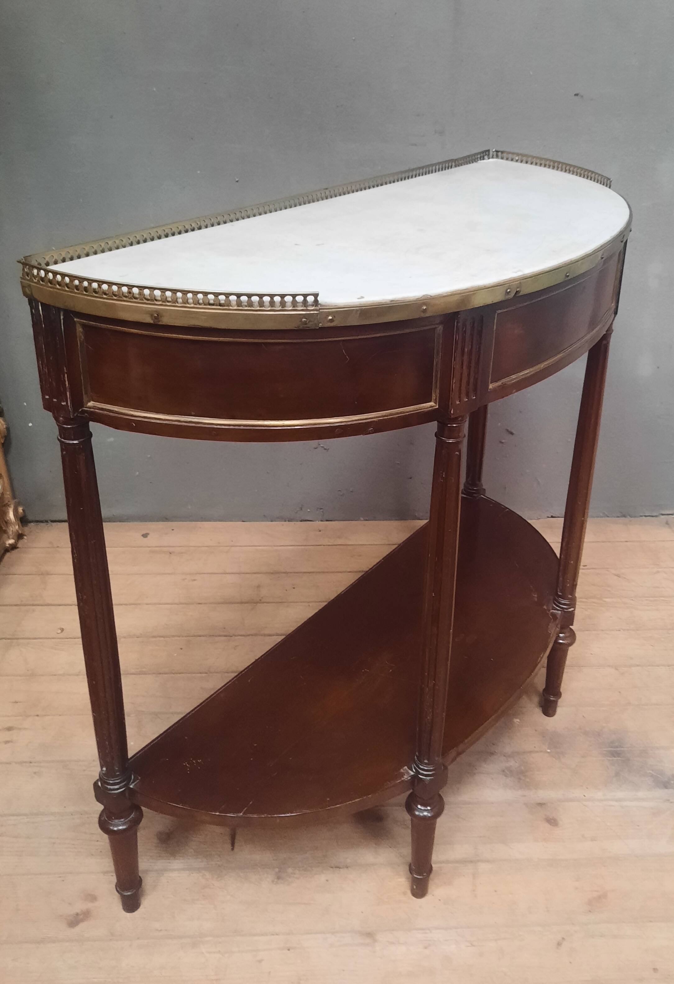 Louis XVI period demi-lune console in mahogany.