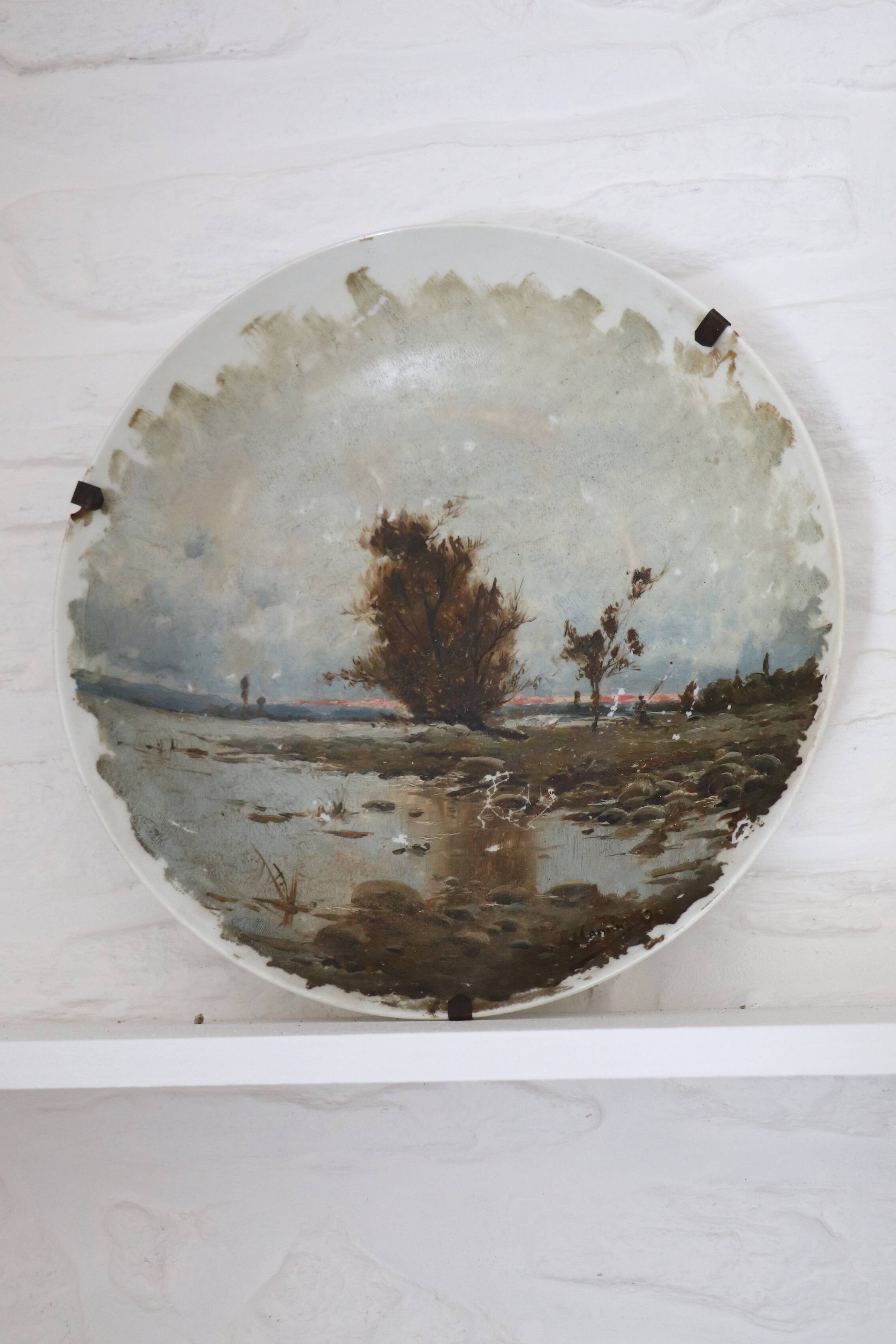 Pair of large hand-painted plates, sailing boat and landscape – late 19th century